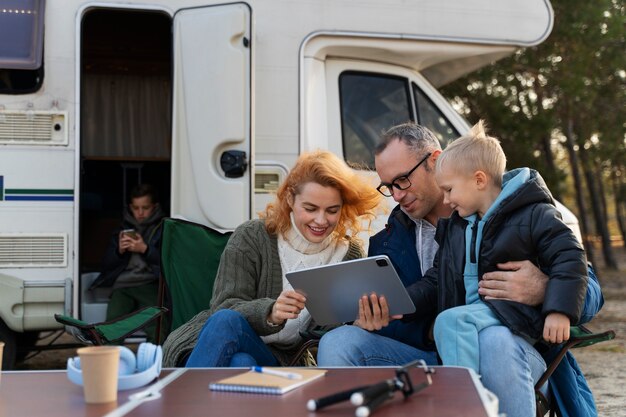 Medium shot nomad family outdoors
