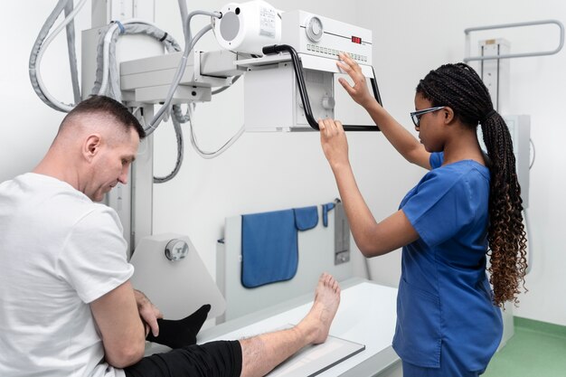 medium shot nurse preparing machine
