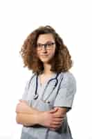 Free photo medium shot nurse with stethoscope