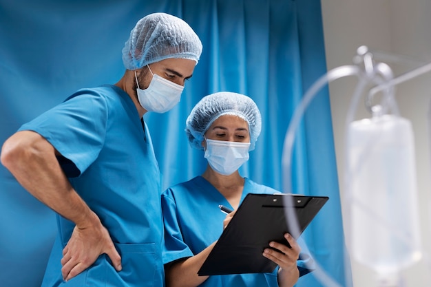 Medium shot nurses with face masks