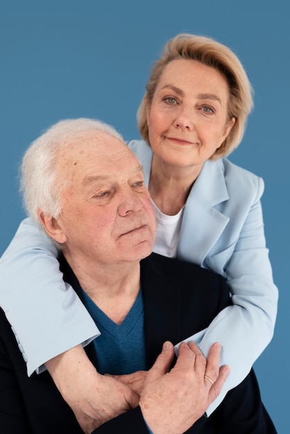 Medium shot old couple posing together