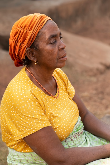 Free photo medium shot old woman exterior portrait