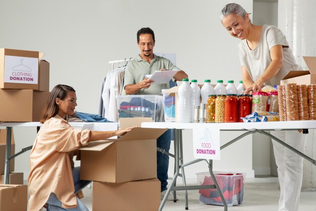 medium shot people arranging products