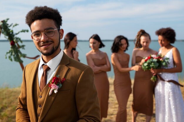 Medium shot people celebrating wedding in nature