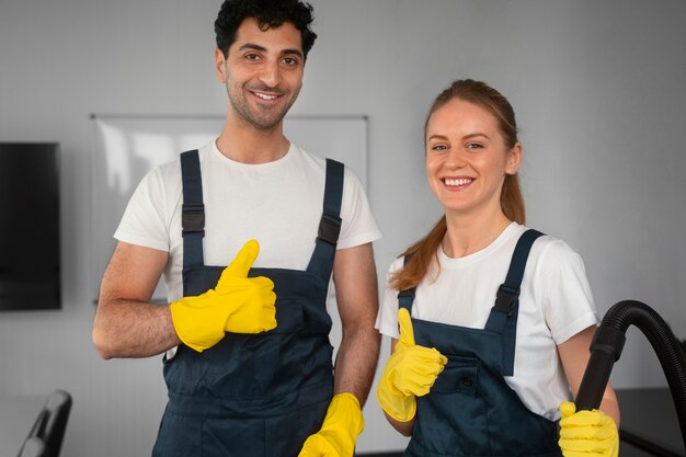 Medium shot people cleaning building