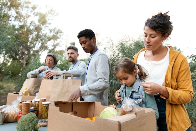 Medium shot people collecting food