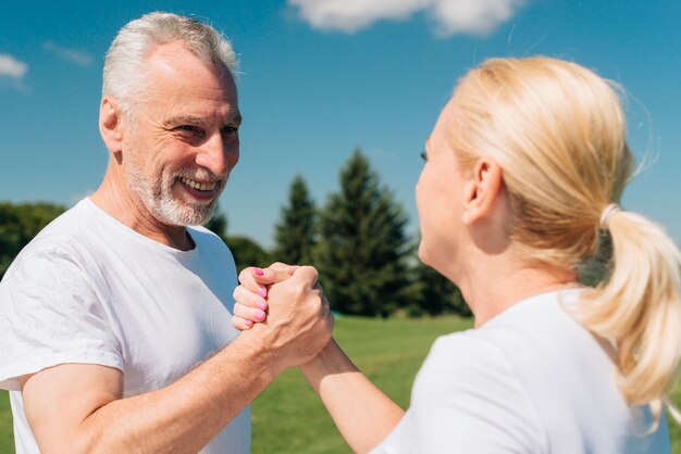 Medium shot people holding hands