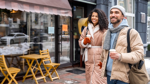 Free photo medium shot people holding hands