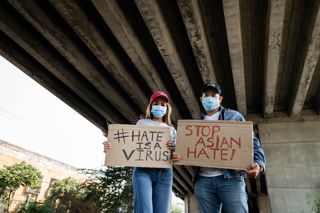 Medium shot people holding placards