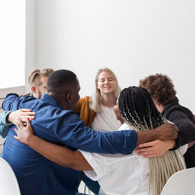 medium shot people hugging