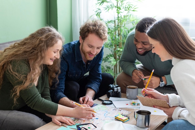 Free photo medium shot people planning trip together