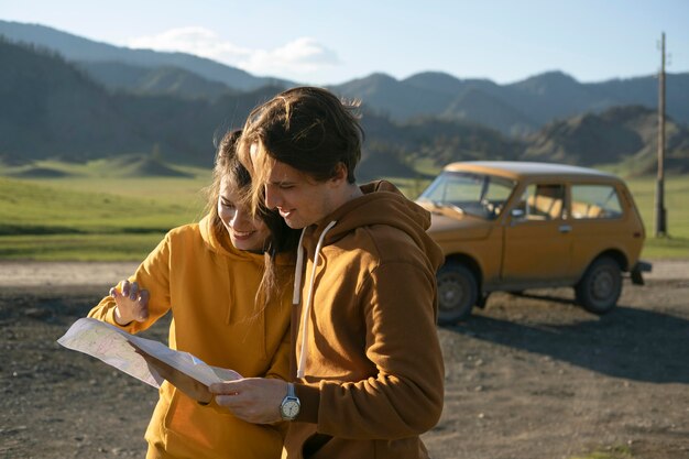 Medium shot people reading map