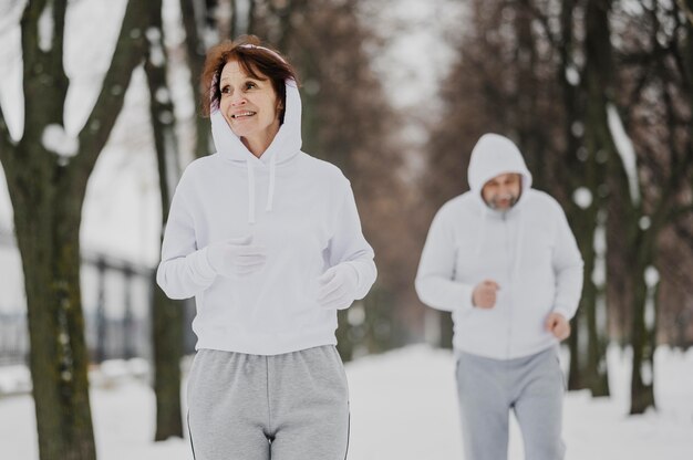 Medium shot people running