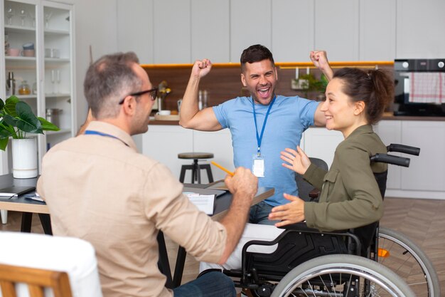 Medium shot people talking to doctor