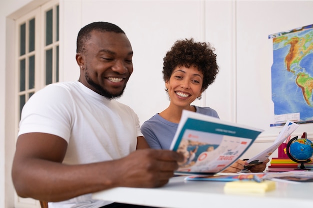 Medium shot people in  travel agency office