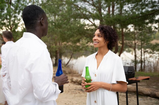 Medium shot people wearing white clothes