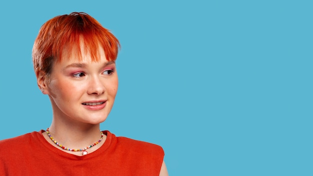 Free photo medium shot queer woman posing with copy space