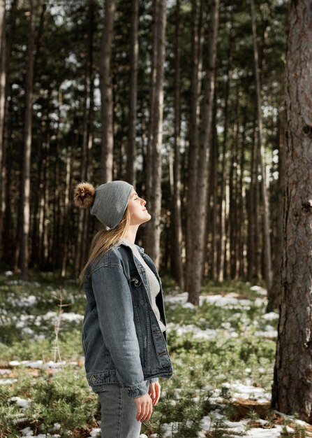 Medium shot relaxed woman outdoors