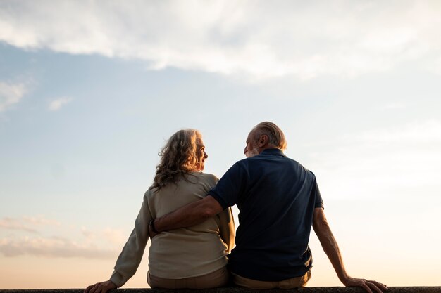 Medium shot romantic couple outdoors