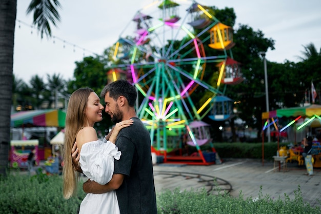 Medium shot romantic couple outdoors