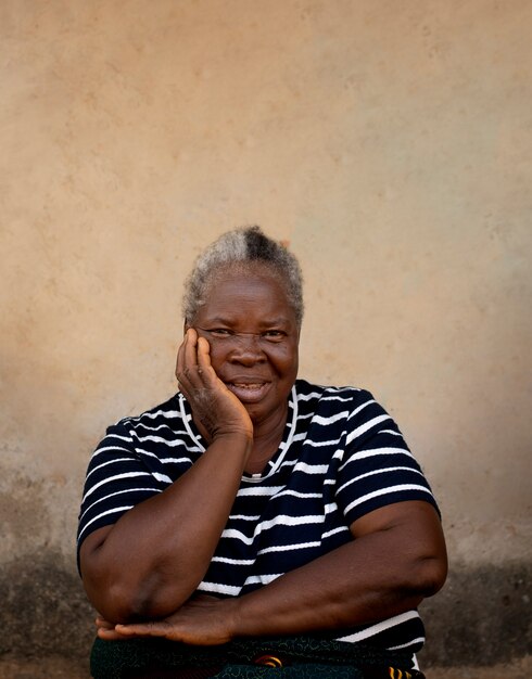 Medium shot senior black woman posing