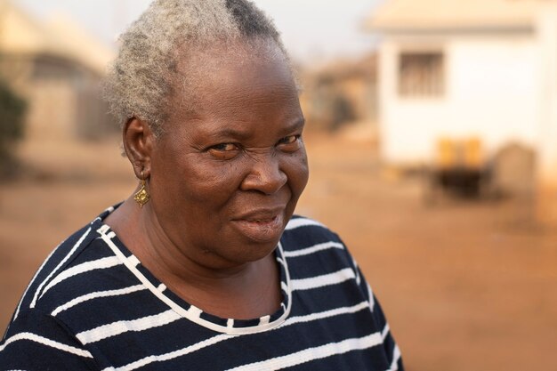 Medium shot senior black woman posing