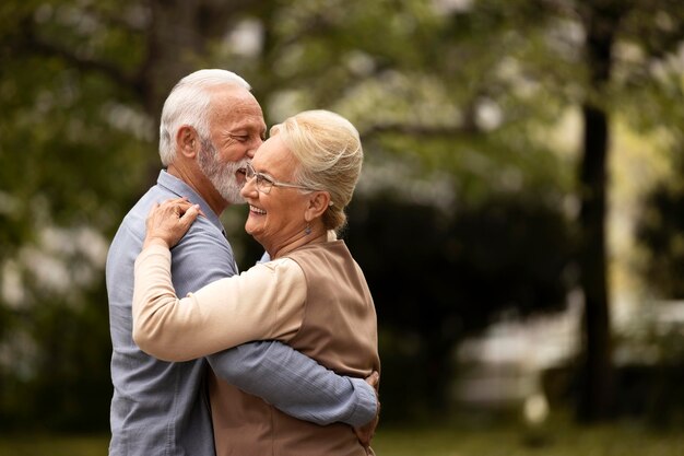 Medium shot senior couple dancing