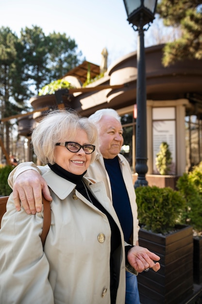 Medium shot senior people walking together