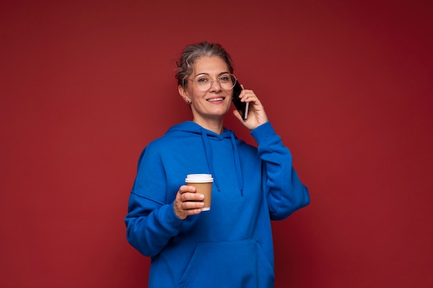 Medium shot senior woman talking on phone