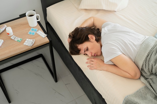 medium shot sick woman sleeping