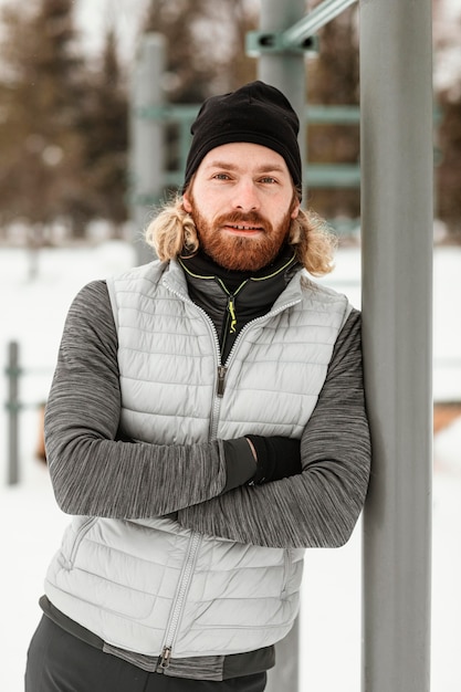 Free photo medium shot smiley athlete outdoors