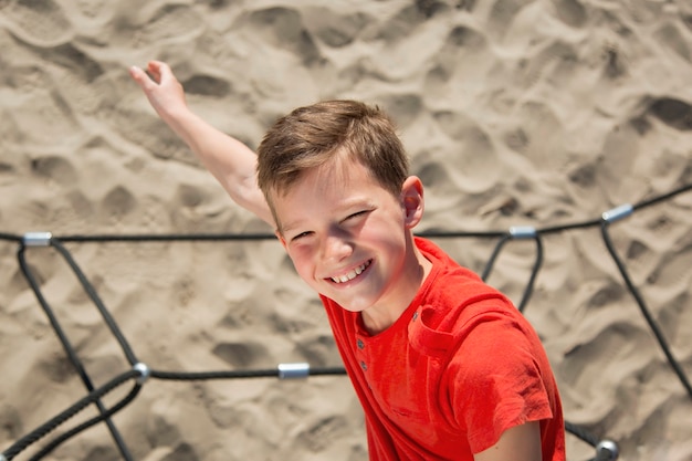 Free photo medium shot smiley boy outdoors