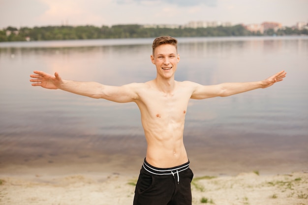 Medium shot smiley boy with outstretched arms 