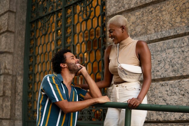 medium shot smiley couple outdoors