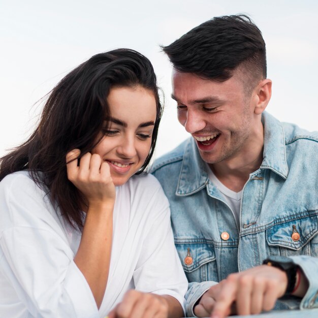 Medium shot smiley couple together