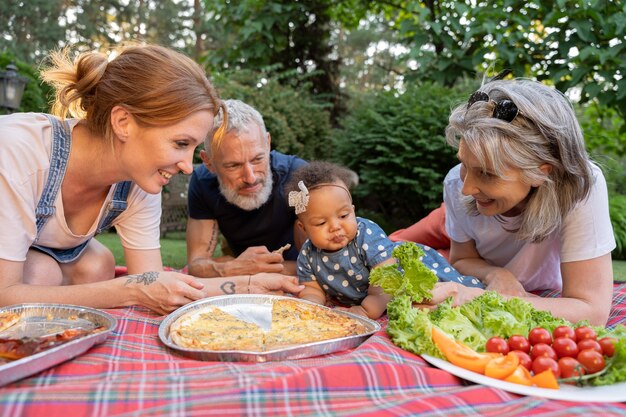 medium shot smiley family with food