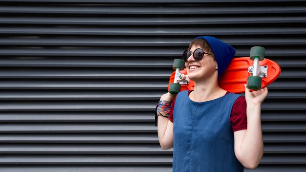 Medium Shot Smiley Girl Holding Penny Board