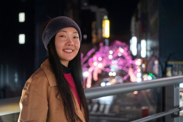 Medium shot smiley girl wearing hat