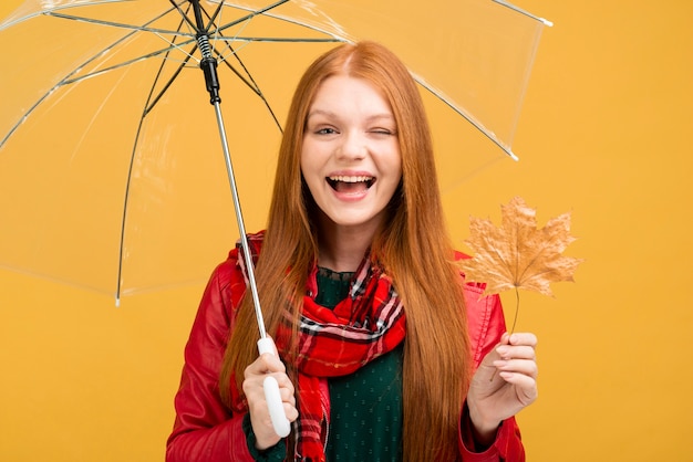 Free photo medium shot smiley girl winking