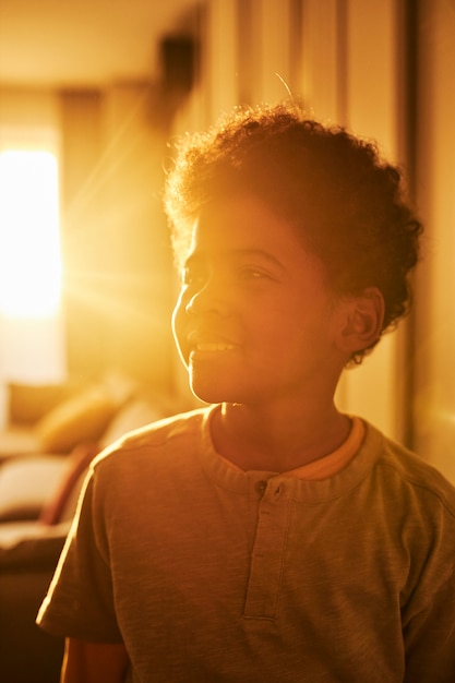 Free photo medium shot smiley kid at home