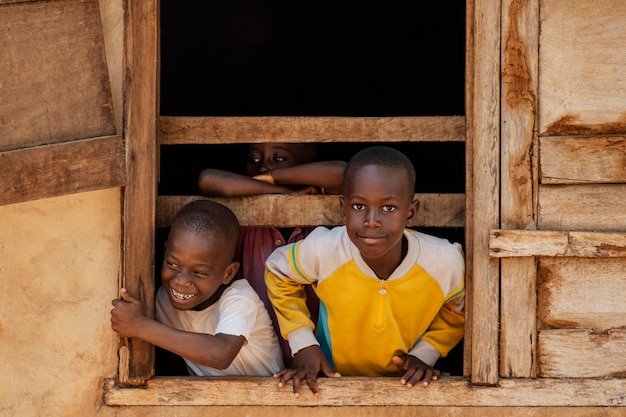 Medium shot smiley kids posing together