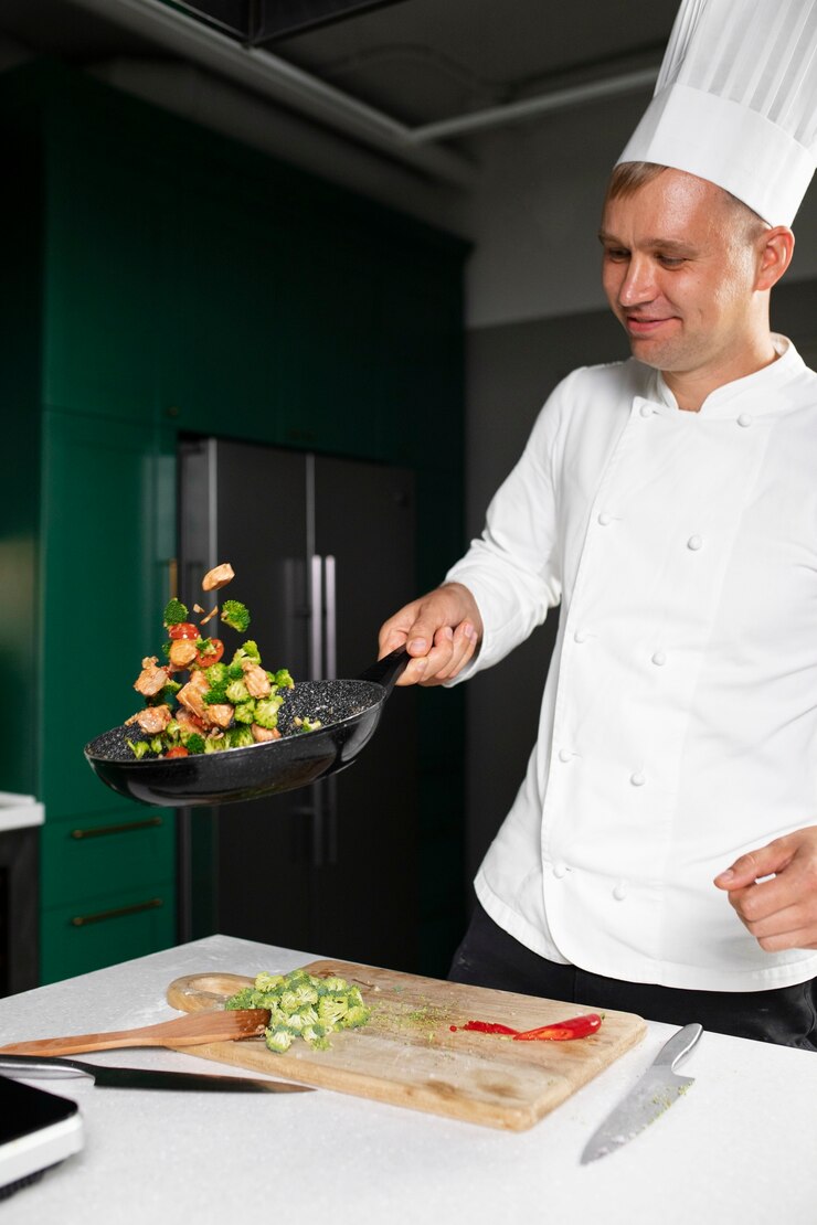 Free Photo medium shot smiley man cooking