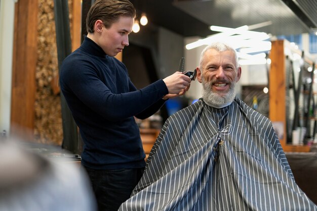 Medium shot smiley man getting groomed