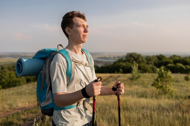 Medium shot smiley man hiking