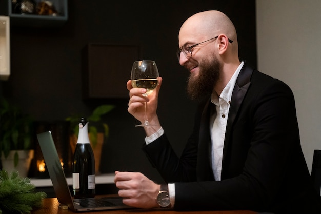 Medium shot smiley man holding drink