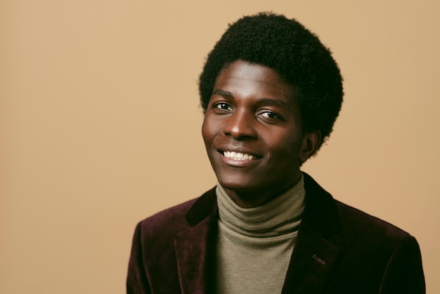 Medium shot smiley man posing in studio