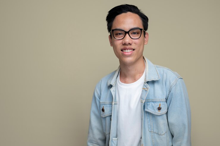 Free Photo medium shot smiley man posing with glasses