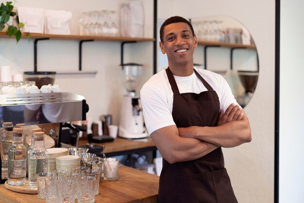 Medium shot smiley man with apron