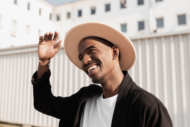 Medium shot smiley man with hat