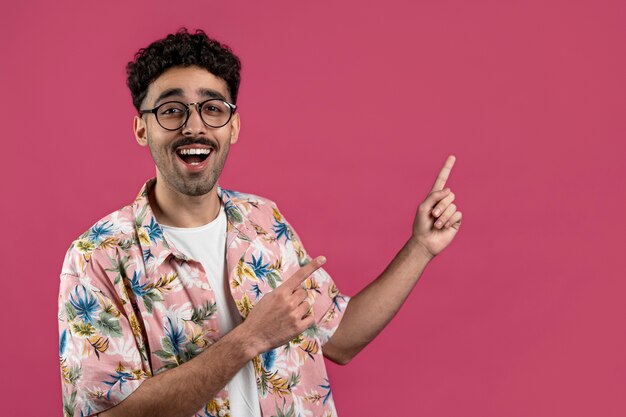 Medium shot smiley man with pink background